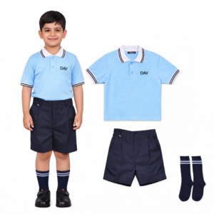 Young boy wearing the new 2026 DAV Nursery summer uniform – sky‑blue polo shirt with white collar and navy stripes, navy‑blue shorts and socks – displayed alongside the individual shirt, shorts and socks