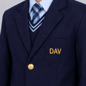 Close-up image of DAV school blazer showing embroidered logo gold buttons tie and premium navy blue fabric texture