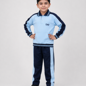Full body studio image of Indian school boy wearing DAV winter tracksuit uniform with matching navy blue sports lower and sweatshirt