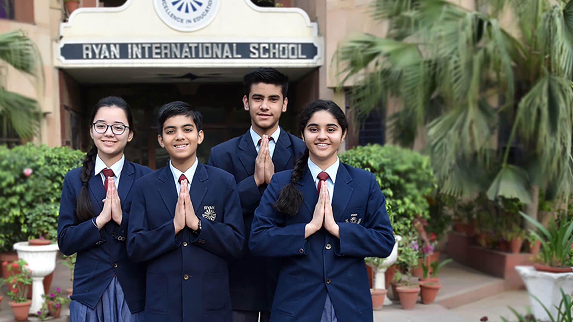 Ryan International School students in formal school uniform with blazer – custom school uniform supplier Essay Sports